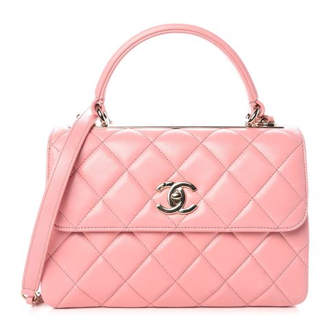 chanel pink quilted handbag.